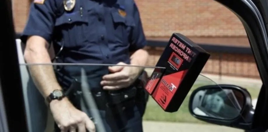Police with tint meter
